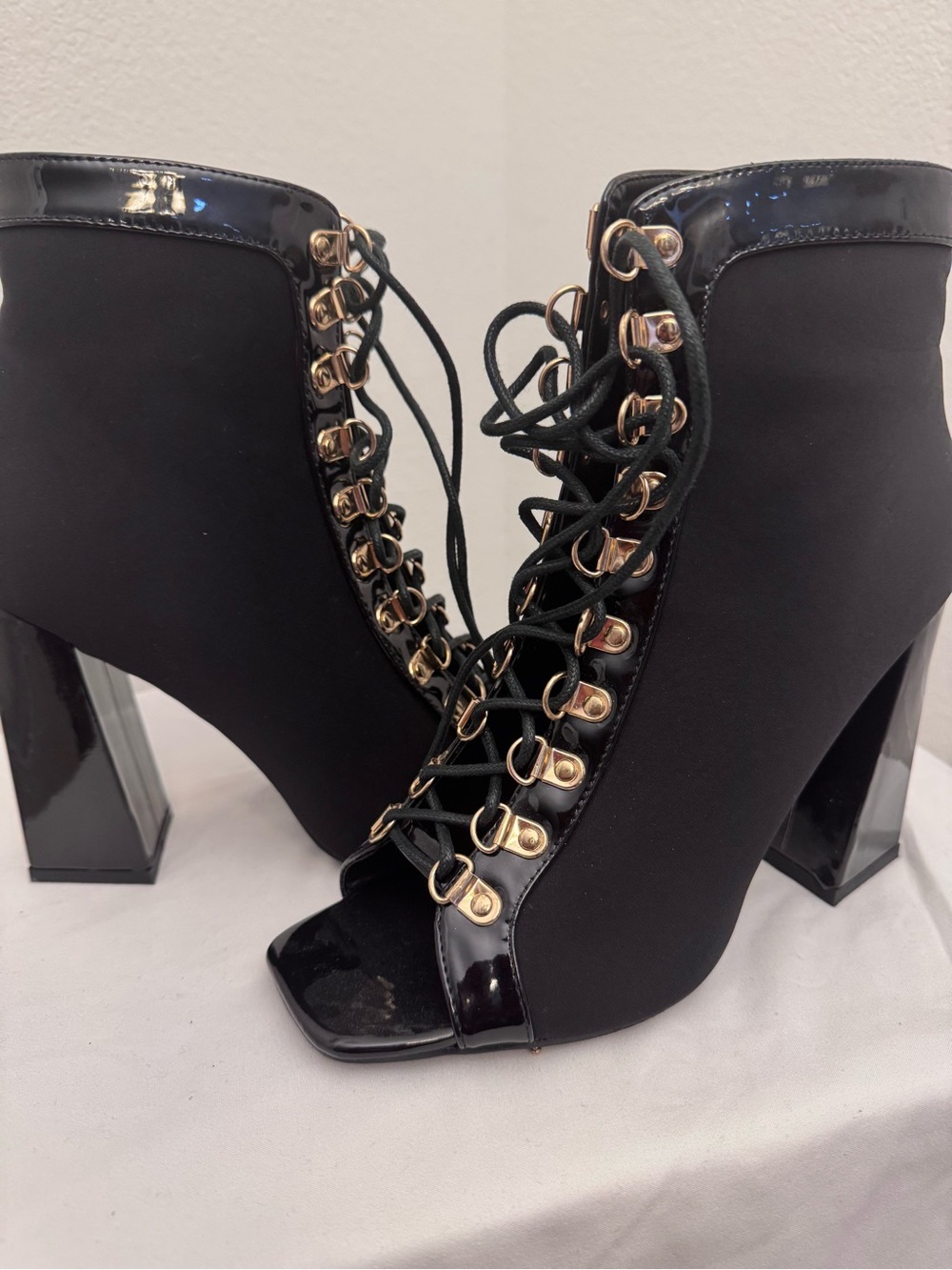 Black Lace-Up Peep Toe Block Heel Booties with Gold Eyelets
